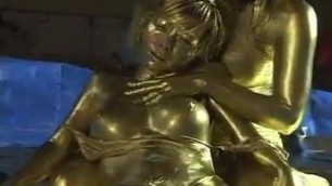 Queen tortures gold painted slave